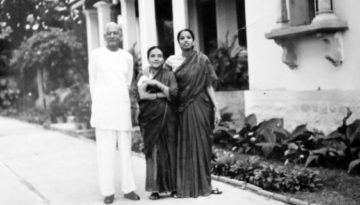Indira with her parents and dog, Susie