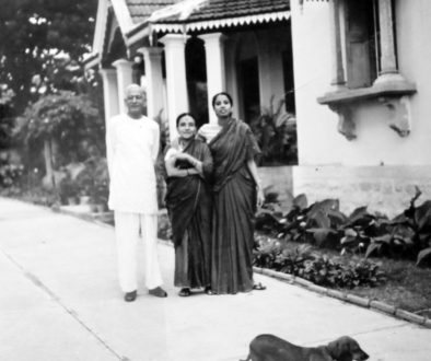 Indira with her parents and dog, Susie