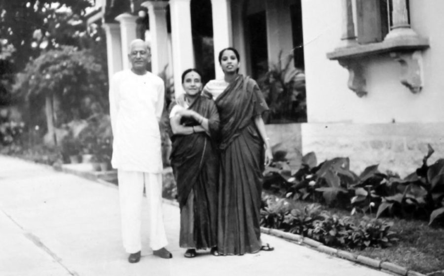 Indira with her parents and dog, Susie
