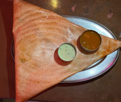 A dosa with lentil soup and coconut chutney at Dosa Delight. Photo by Ramaa Reddy