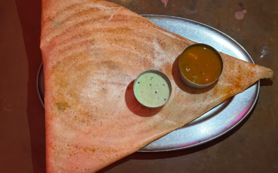 A dosa with lentil soup and coconut chutney at Dosa Delight. Photo by Ramaa Reddy