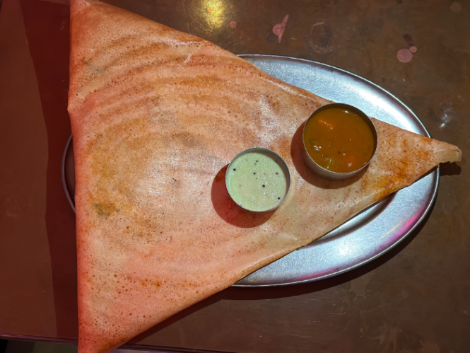 A dosa with lentil soup and coconut chutney at Dosa Delight. Photo by Ramaa Reddy